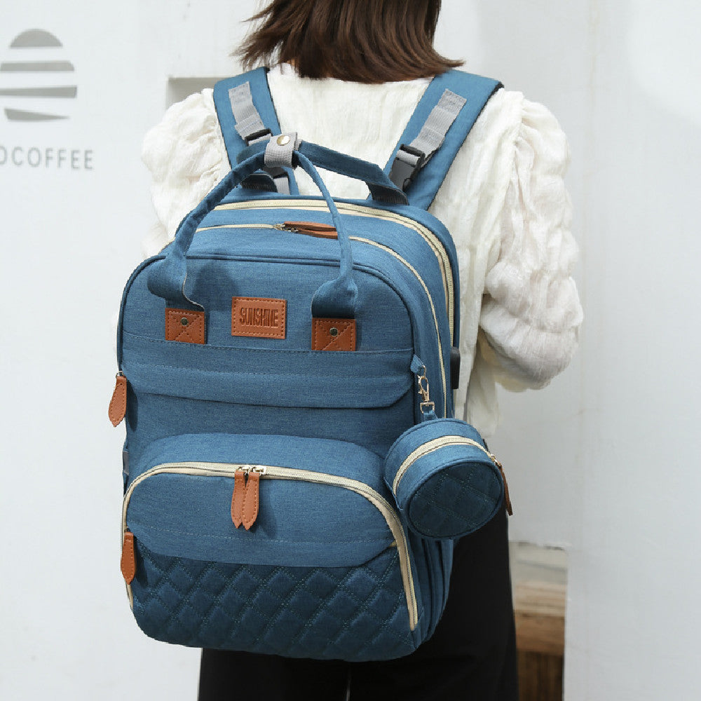 Mune's Cradle Backpack Diaper Bag with Changing Station & Phone Charging Port